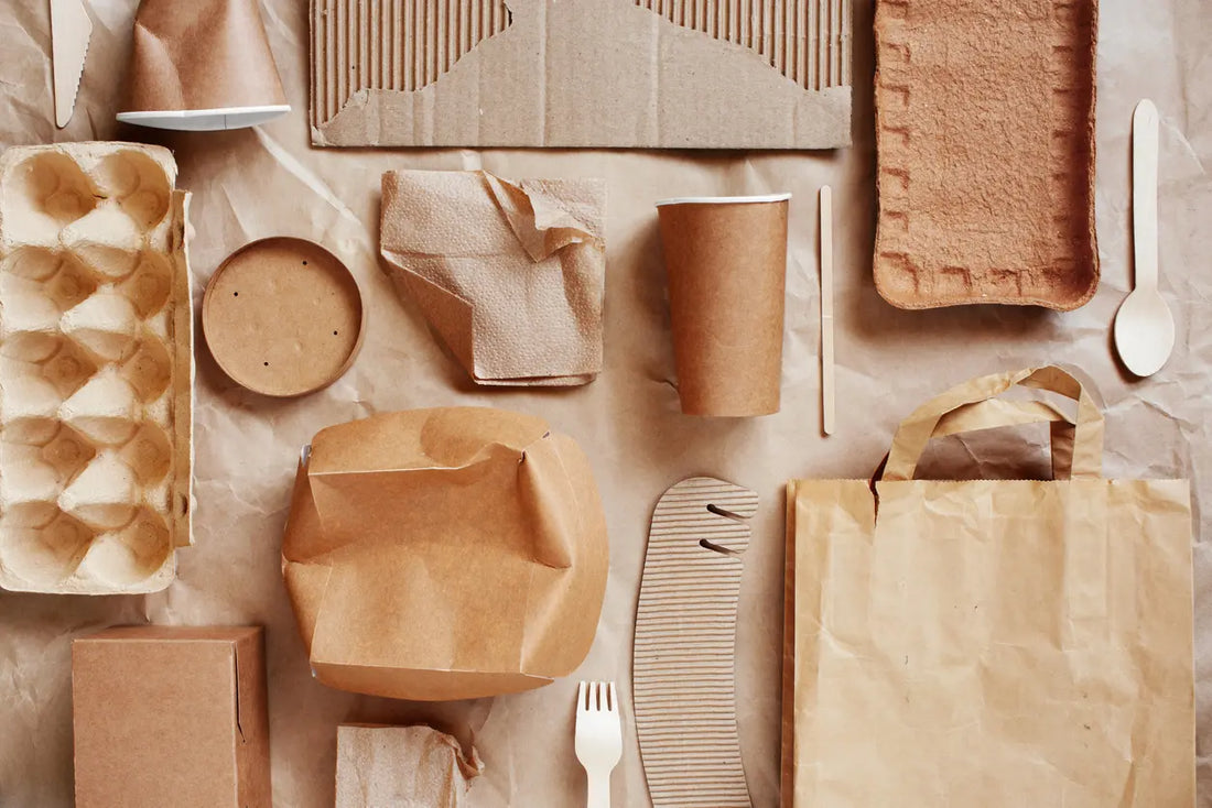 Image of eco-friendly packaging made from sustainable materials, featuring recyclable and compostable options. The packaging showcases a commitment to reducing plastic waste and promoting environmentally conscious choices in product design.